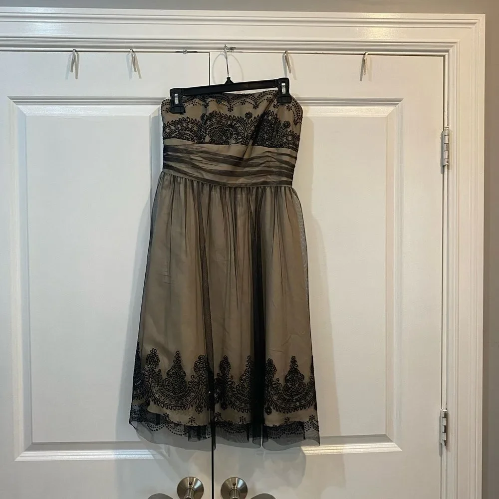 David’s bridal strapless dress with bead detail and sparkle. Worn once. EUC